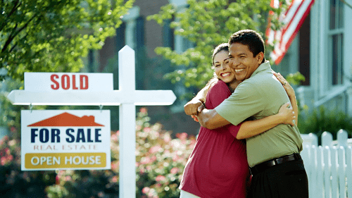 Couple embracing as they got house with Bank Statement Loan assistance